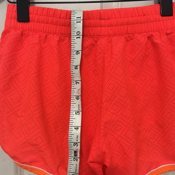 Under Armour semi fitted heat gear running shorts Size small bright pink orange - Picture 3 of 5